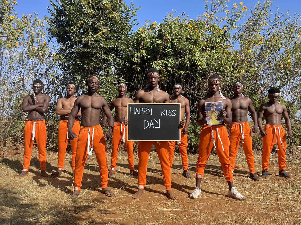 African Orange Pants Team